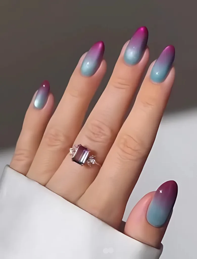 Blue to pink gradient nail art design featuring a smooth color transition
